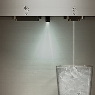 A glass filled with ice is being placed under a water dispenser, with water pouring from the right nozzle and light shining from above. Icons for ice and water are visible above the nozzles.